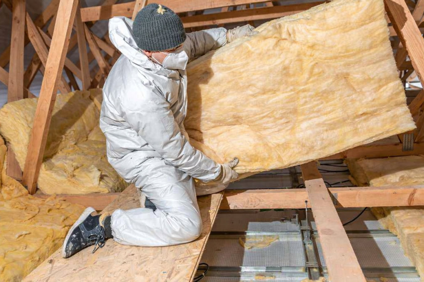 Champaign Insulation crew insulating an attic in Champaign, IL